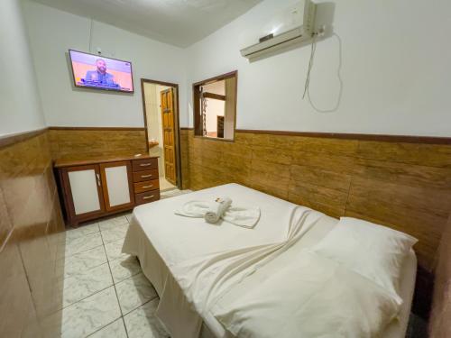 Un ou plusieurs lits dans un hébergement de l'établissement pousada Vitoria