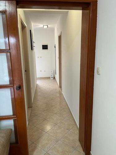 a hallway with a hallway leading to a room at Apartment Seman in Vela Luka