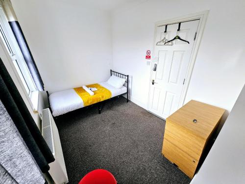 Łóżko lub łóżka w pokoju w obiekcie The Private Rooms in Paddington