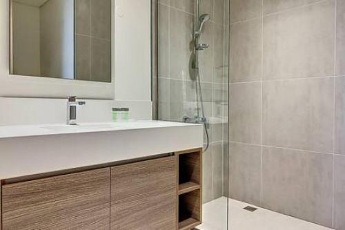 a bathroom with a sink and a shower at Key View - Creek Edge T2 in Dubai
