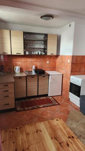 Η κουζίνα ή μικρή κουζίνα στο Olja Guest House