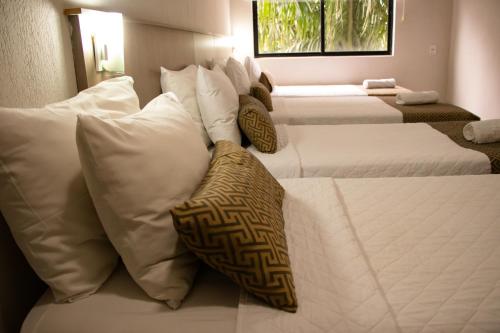 Cama o camas de una habitación en Iguassu Express Hotel