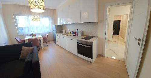 a kitchen with a sink and a counter top at Tsar Asen 21 in Sofia