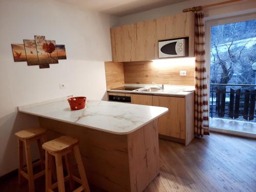 Kuchyňa alebo kuchynka v ubytovaní Vacanzemoena - Casa al Parco, tipologia 1