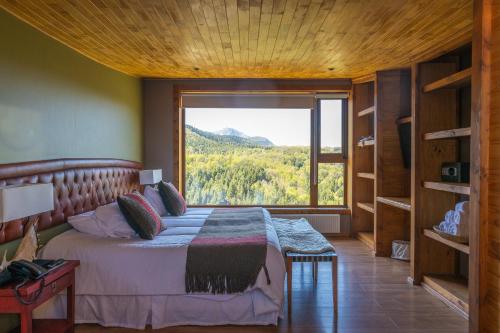 Postel nebo postele na pokoji v ubytování NÓMADES Hotel Boutique