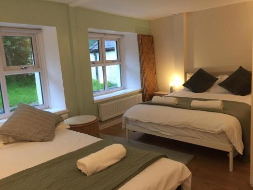Letto o letti in una camera di Snowdonia Mountain Lodge