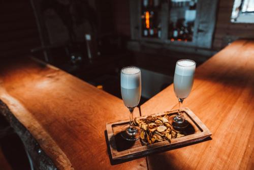 Nápoje v ubytování NÓMADES Hotel Boutique