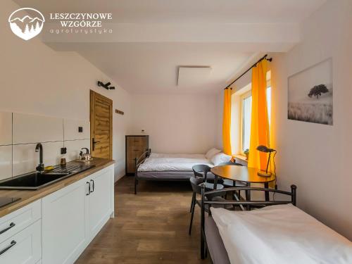 Katil atau katil-katil dalam bilik di Agroturystyka Leszczynowe Wzgórze