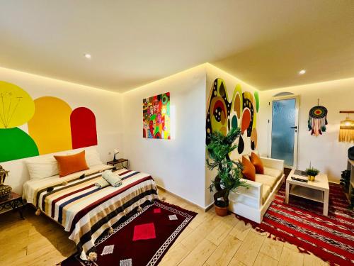 Ένα ή περισσότερα κρεβάτια σε δωμάτιο στο Art studio mazighen