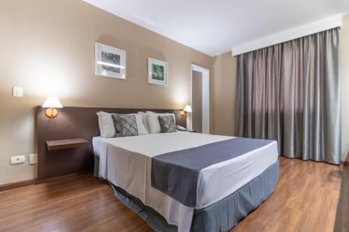 Postel nebo postele na pokoji v ubytování Gran Villagio Hotel SP by Castelo Itaipava