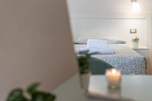 Postel nebo postele na pokoji v ubytování Il Terrazzino Su Boboli