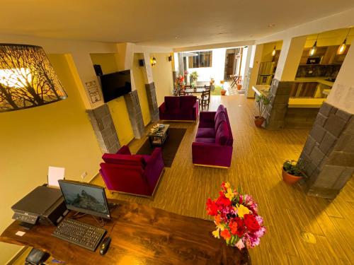 TV a/nebo společenská místnost v ubytování Pisonay Hotel