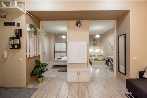 a large living room with a room with a couch and a room with a room at RoomBack Rooms - 2BR Apt with AC near Deak ter in Budapest