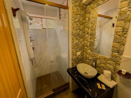 Koupelna v ubytování Pisonay Hotel