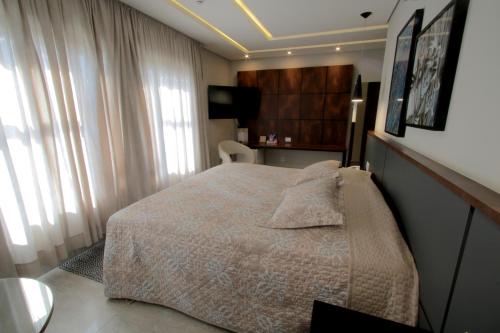 Adria Premium Hotelにあるベッド