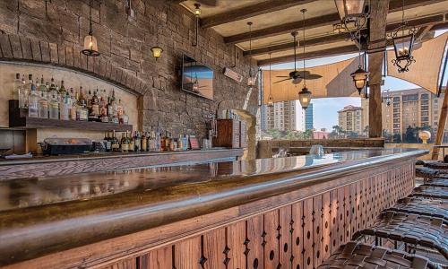 a bar with a view of a city at Bonnet Creek Resort 1 Bedroom 1 BA Deluxe Villa in Orlando