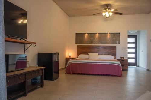 En eller flere senge i et værelse på La Ventana Beach Resort