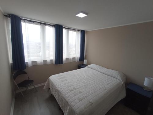 Ένα ή περισσότερα κρεβάτια σε δωμάτιο στο Alta vista a la bahia