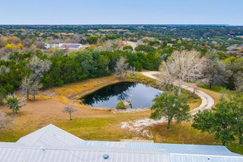 an aerial view of a pond in a field at Rockin' 7 in Glen Rose