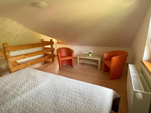 Postel nebo postele na pokoji v ubytování Penzión Pod Guglom