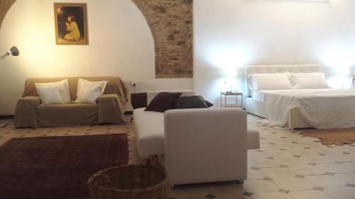 Ένα ή περισσότερα κρεβάτια σε δωμάτιο στο Agriturismo Debbione Marconi