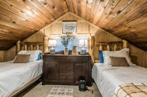 A bed or beds in a room at Chester Cabin BY Betterstay