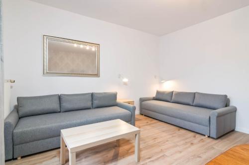 Posezení v ubytování Willa LTC Apartments Orłowo