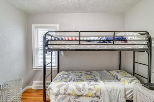 a bedroom with a bunk bed in a room at Updated Detroit Vacation Rental about 9 Mi to Downtown in Detroit