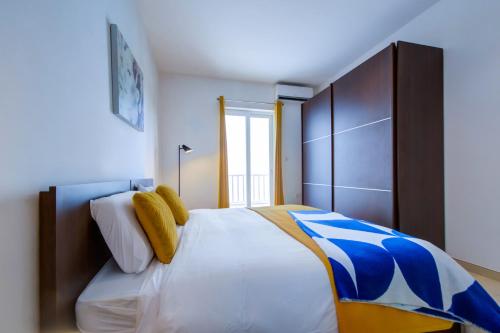 Ένα ή περισσότερα κρεβάτια σε δωμάτιο στο Prime Location, Modern Apartment in St Julian's, Paceville, APT 8 by Vaganza