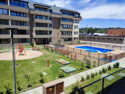 Πισίνα στο ή κοντά στο Departamento Central 2 habitaciones, 1 cuadra de la Playa