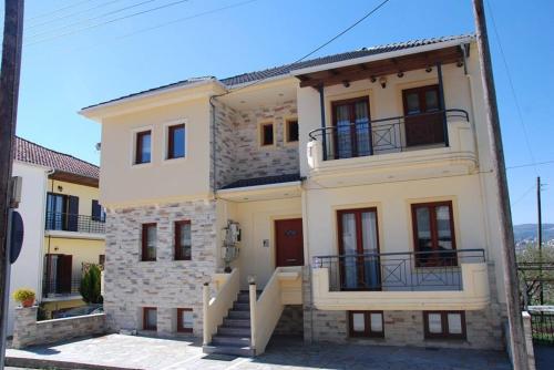 a villa with a view of the mountains at Nikos Apartments in Ioannina