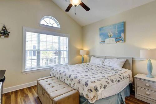 a bedroom with a bed and a window at Spacious House with Pool near the Beach 2165 in Myrtle Beach