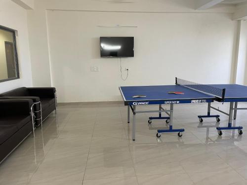 Stolní tenis v ubytování Abuzz Oxfordcaps Cedar Homes nebo okolí