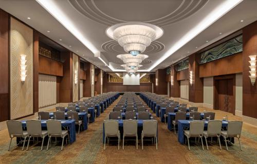 a large room with rows of tables and chairs at Windsor Hotel & Convention Center Istanbul in Istanbul