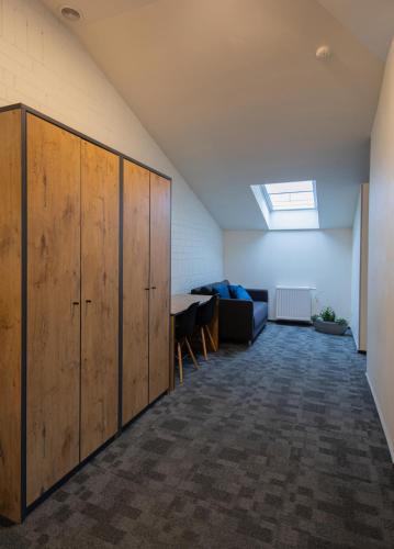 Ein Sitzbereich in der Unterkunft Loft Inn SELF-CHECK IN