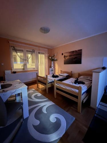 Postel nebo postele na pokoji v ubytování Apartman B&S Apatin