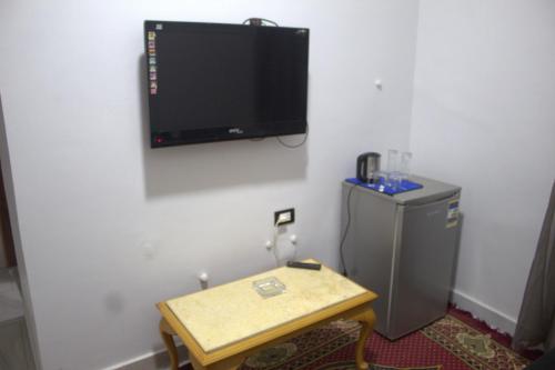 TV a/nebo společenská místnost v ubytování Abeer Guest House