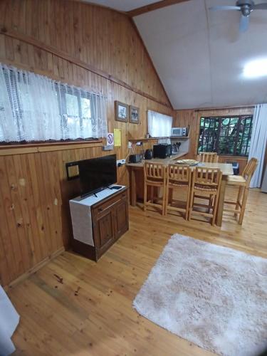 a large room with a kitchen and a dining room at Crocodile Nest B&B in Nelspruit