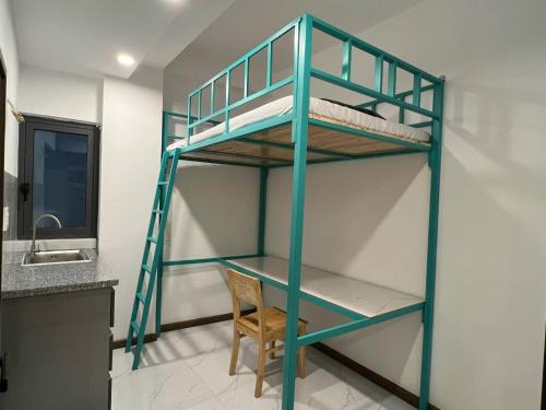 Μία ή περισσότερες κουκέτες σε δωμάτιο στο Smiley Apartment Quận 2