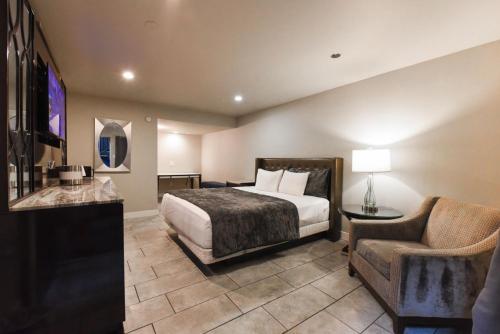 Łóżko lub łóżka w pokoju w obiekcie Boardwalk Suites Las Vegas