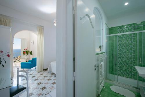 a bathroom with a shower and a sink at Il Barilotto in Positano
