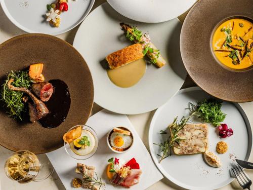a group of plates of food on a table at Tokyo Bay Shiomi Prince Hotel in Tokyo