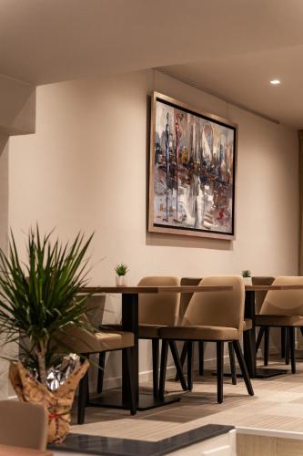 a dining room with a table and chairs at 507 Athens in Athens