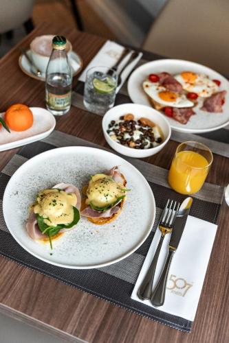a table with plates of food on top of it at 507 Athens in Athens