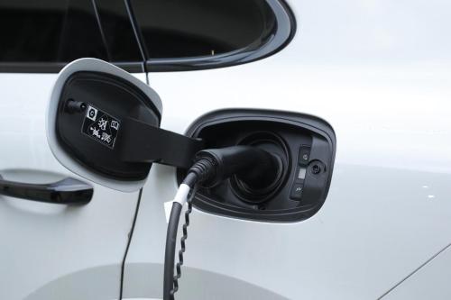 a car with a charging cord attached to it at Nobel Gallery Hotel in Belgrade