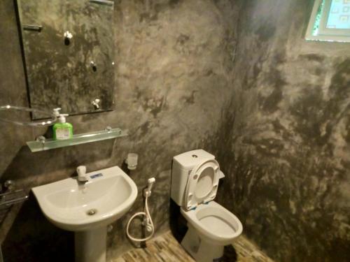 Koupelna v ubytování Opara Palace