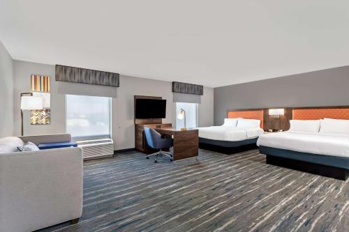 Ένα ή περισσότερα κρεβάτια σε δωμάτιο στο Hampton Inn & Suites Richmond