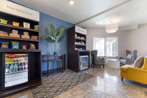 a waiting room with a soda machine in a store at Comfort Suites Oceanside Camp Pendleton Area in Oceanside