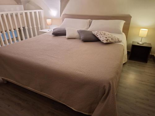 Giường trong phòng chung tại LA CASA DI NANA'