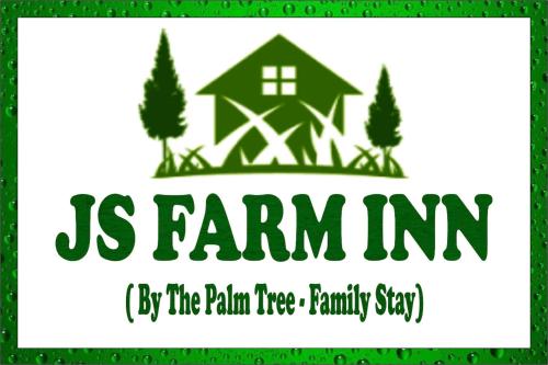 a us farm inn logo with a green house at JS Farm Inn (By The Palm Tree - Family Stay) in Amritsar